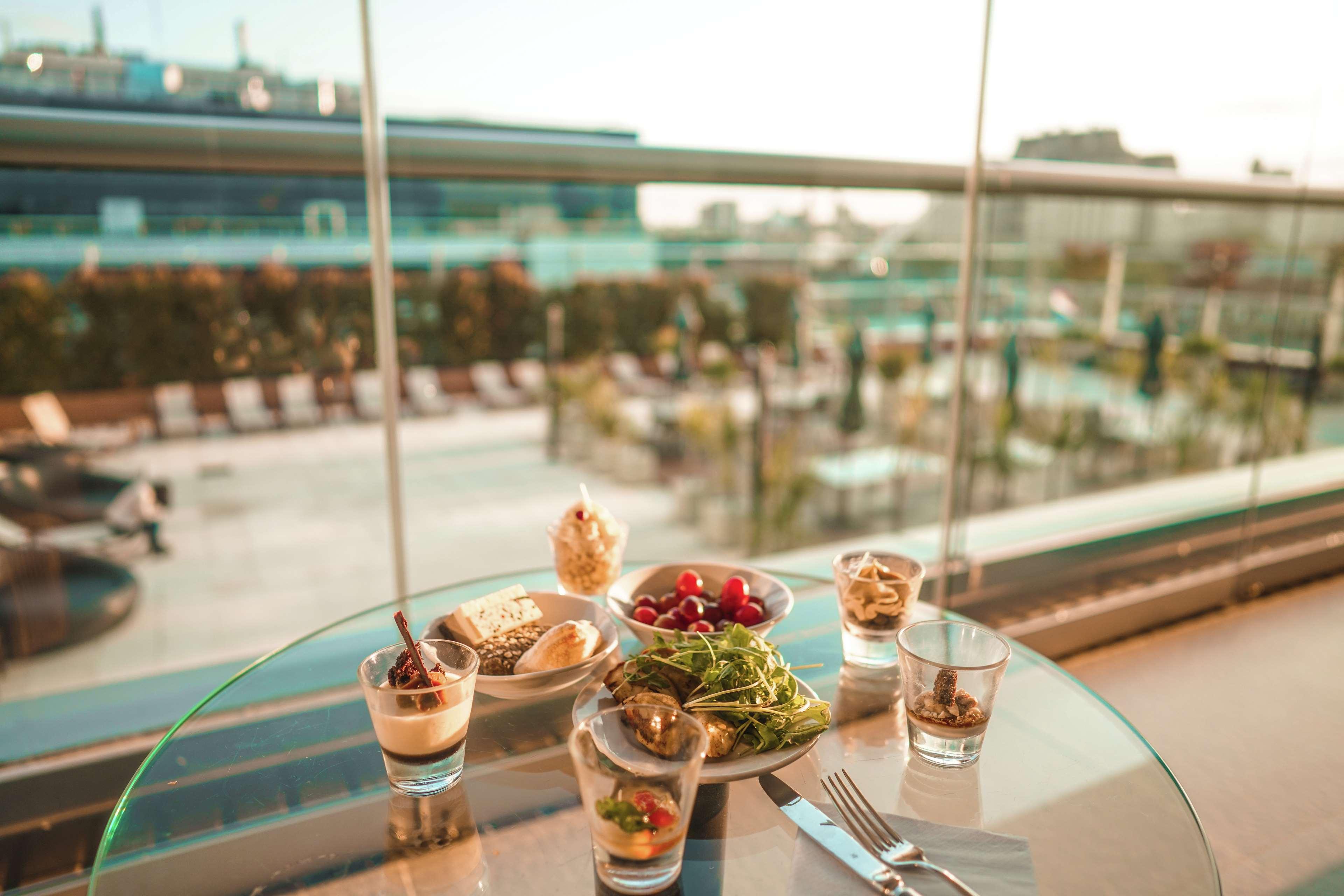 Hotel Hilton Buenos Aires Esterno foto A selection of desserts at the Sky Bar